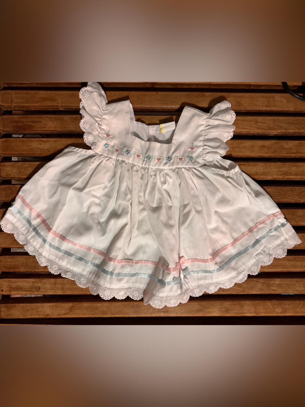 White Eyelet Smocked Baby Dress with Pink & Blue Trim